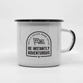 White enamel camp mug with black rim and handle featuring FFBC flag logo and text on a white background
